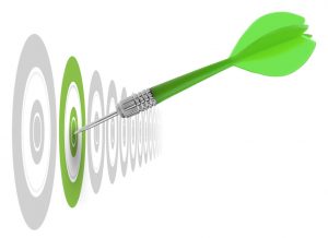 successful dart reaching the green goal, symbol a success or a business challenge, the image is isolated on a white background - illustration